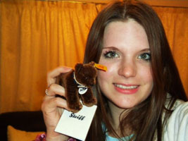 Here Is Sarah Elliot Proudly showing us the little brown bear she won